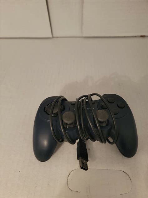 Logitech Dual Action Gamepad USB Game Controller PC G-UF13A VV830 EUC. Logitech. Controllers & Attachments. 0097855018106.