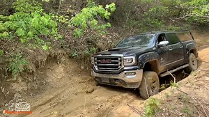 56K views · 1.2K reactions | GMC Sierra 1500 Black Widow - Off-Roading in Mud and Water #GMC #Sierra #SLE #SLT #Denali #Blackwidow #ATV #ATC #V6 #V8 #4WD #4X4 #Hill #mountain #mud #multiterrain #water #rock #luxury #Luxurycars #Crawl #control #turn #Desert #sand #offroad #offroading #4X4offroad #4X4offroading | World Best Cars | Facebook