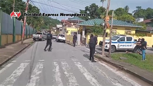 CAPTURED! Police have captured one of the two suspects involved in a shooting in Belmont this afternoon. Express journalist Gyasi Gonzales was there to capture the moment. At 11 a.m. today, two gunmen in a Nissan Tiida ambushed and shot two men at Serranea Road, Belmont. After shooting the two men they attempted to escape the car which they crashed. The two men got out and ran into a drain where they changed their clothes. The drain in question is near the St Francois Girls College. No one enter