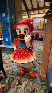 Daisy Duck is ready for Halloween at Clarabelle’s Enchanted Halloween Dinner at the Disneyland Resort. She even has a spider web with the spider dangling from her hat! The character interaction is great at the meal, which is held at Storytellers Cafe in Disney’s Grand Californian Resort. But equally, the food is excellent for a buffet, with carved meats, lobster ravioli, salmon, fruit, desserts and more. We will have a review tomorrow! #daisyduck #disneyland #disneylandhalloween #storytellerscaf