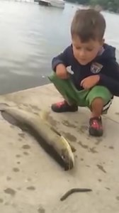 Fish uses his dying breath to slap kid in face... | LADbible