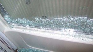 Shower door 'spontaneously' exploded