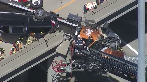 🔴LIVE: Tow truck hangs over overpass after crash | RESCUE IN PROGRESS