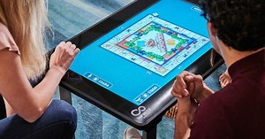 Touchscreen table packs dozens of digital board games and puzzles