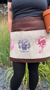 Machine embroidery designs don't need a lot of detail to be beautiful. We're obsessed with the gardening apron that our team made using the new modern blooms motifs. Shop now: Search "modern blooms" to find the designs at emblibrary.com . . . #emblibrary #embroiderylibrary #machineembroiderydesigns #embroiderydesigns #machineembroidery #modernflowers #flowers #digitizing #stitchers #stitching | Embroidery Library