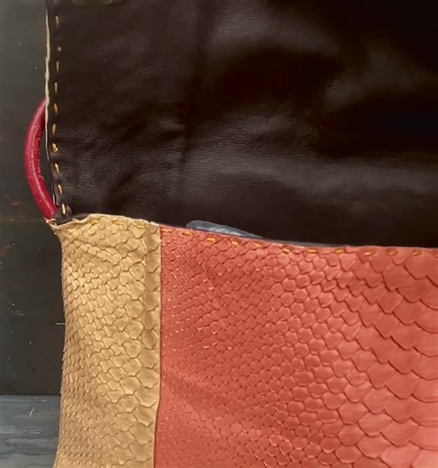 Sophisticated Elegance: Python Crossbody Bag in Soft Peach and Nud. Handcrafted premium design.